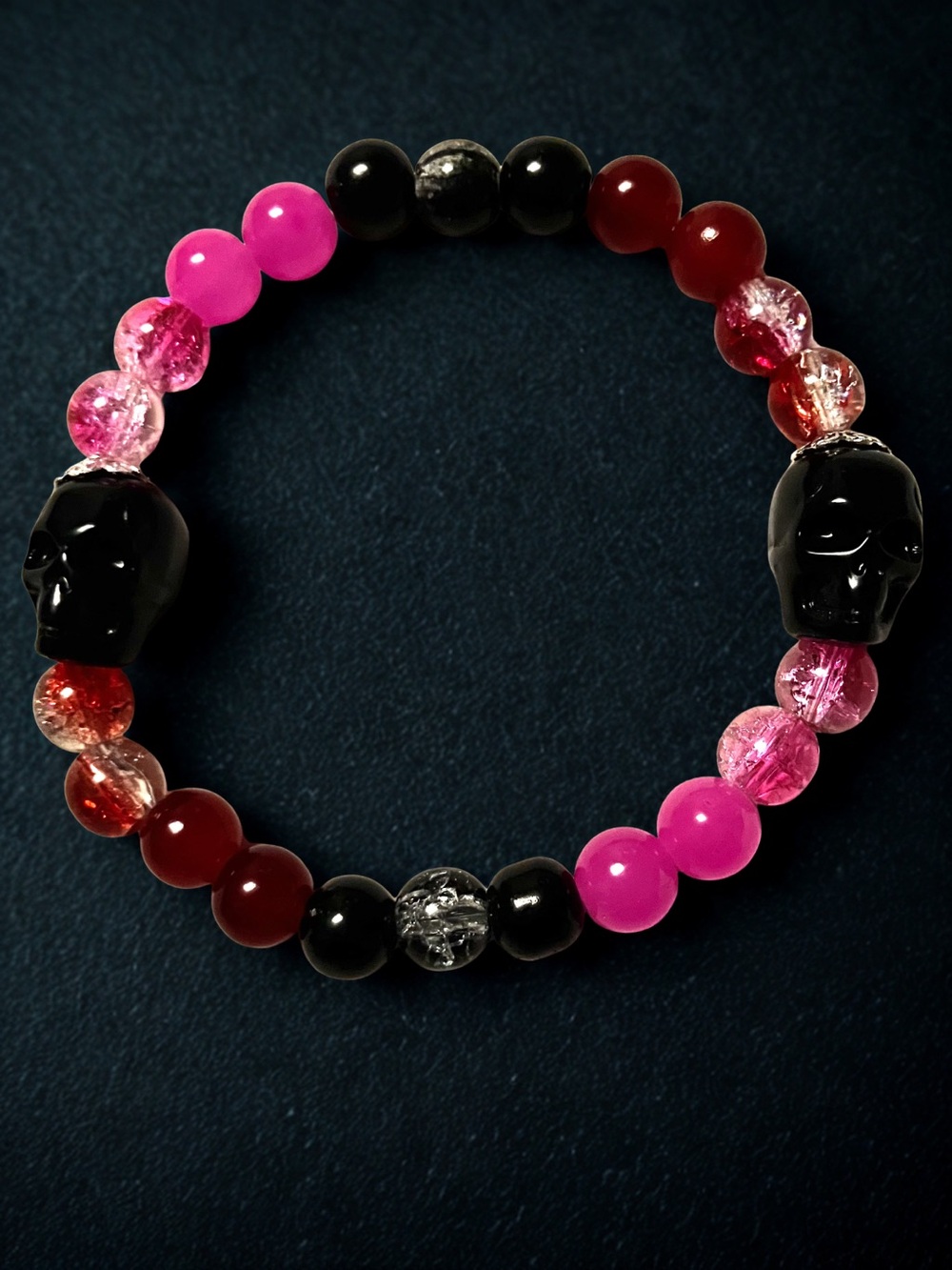 Ruby’s hot pink skull bracelet